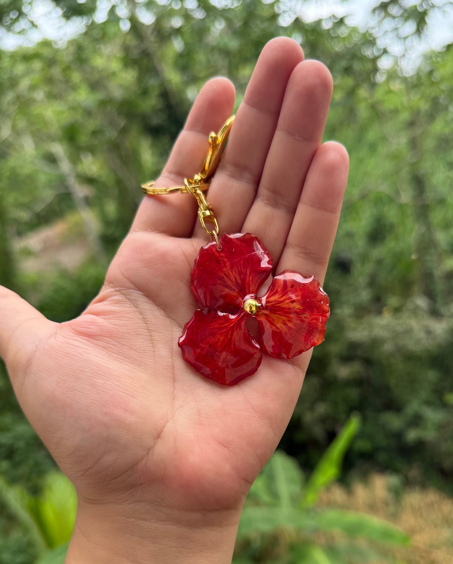 Llevaro o charm de cartera de flamboyan