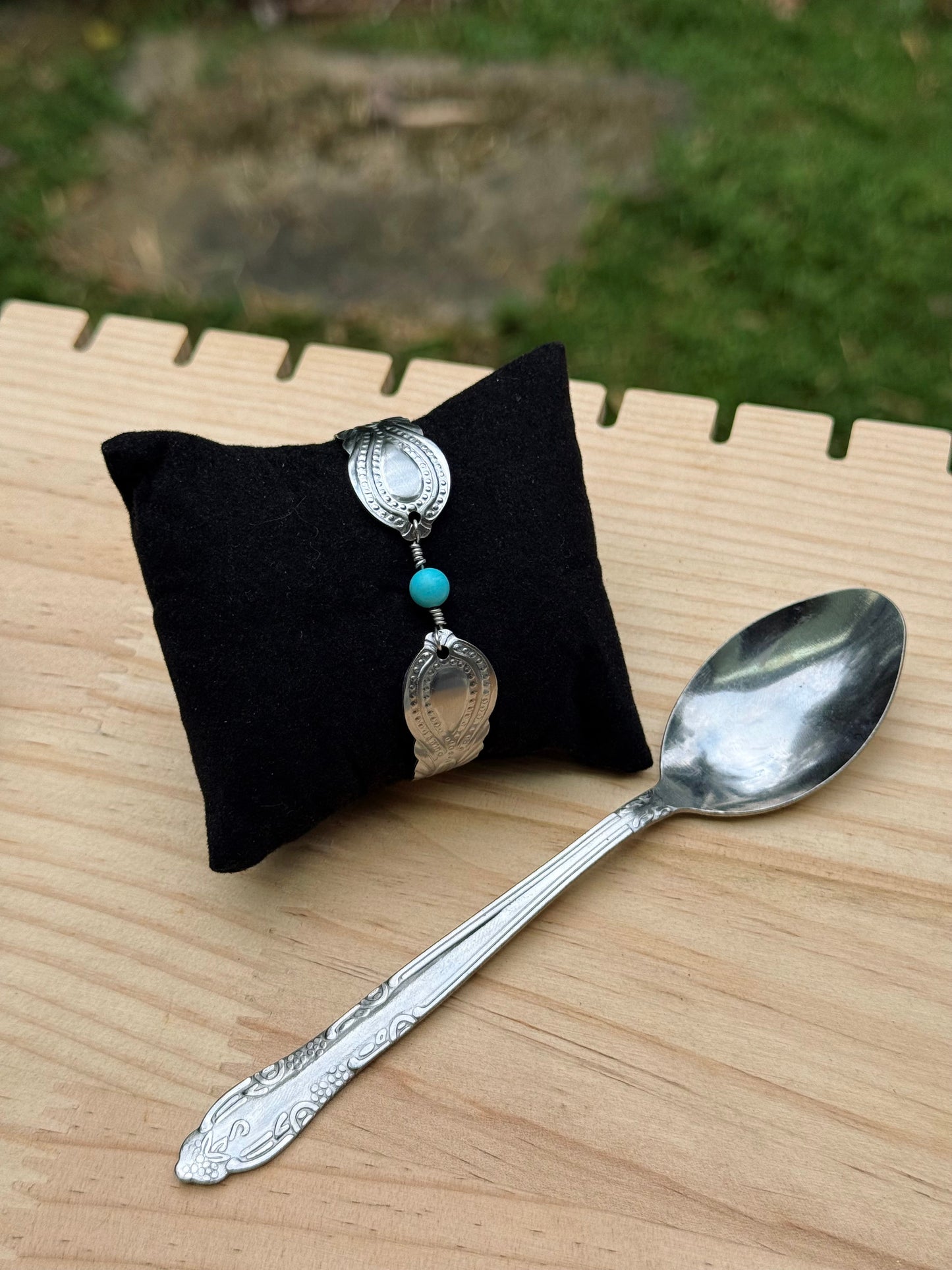 Pulcera de cucharas y piedras